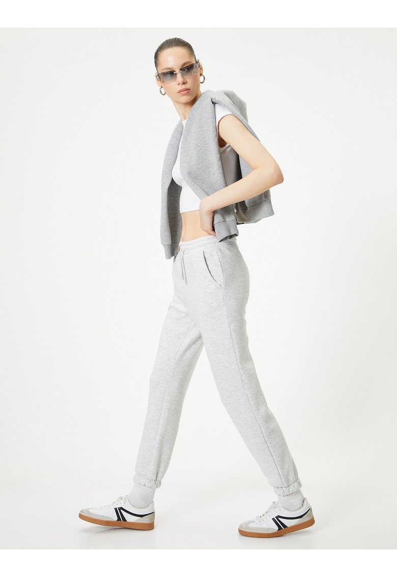 Pantaloni de trening crop cu buzunare oblice