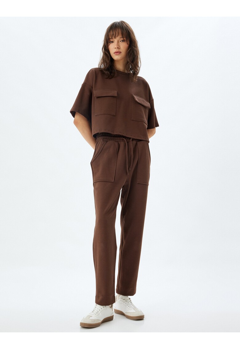 Pantaloni conici de trening cu snururi