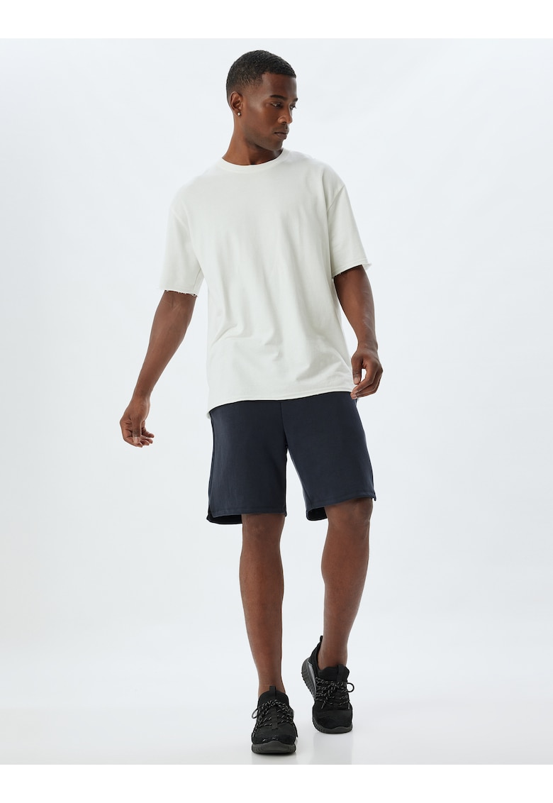 Pantaloni scurti uni cu buzunare laterale