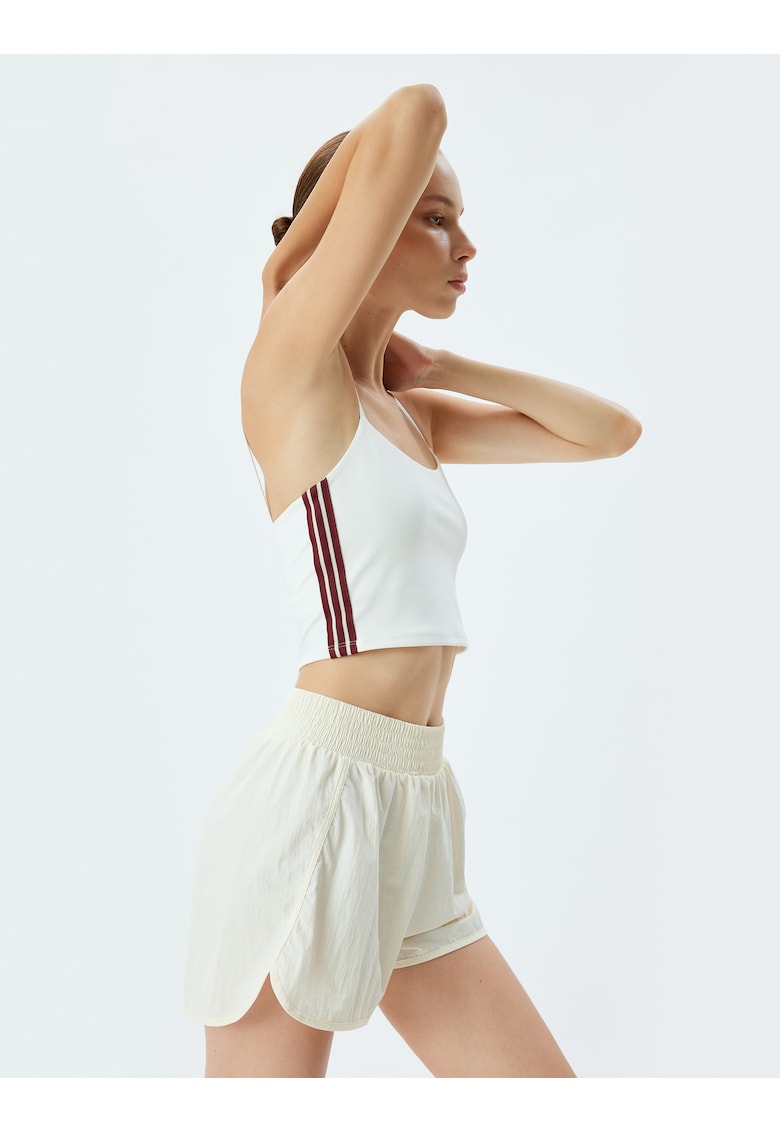 Top cu model in dungi si bretele inguste