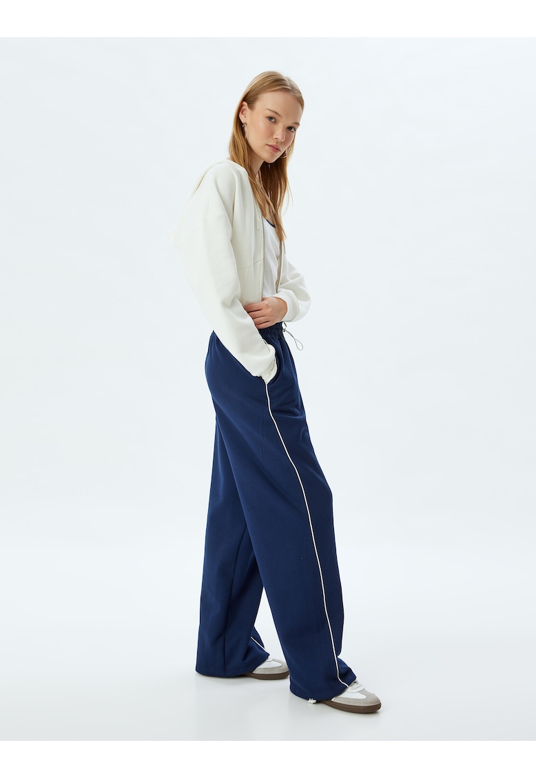Pantaloni relaxed fit cu buzunare laterale