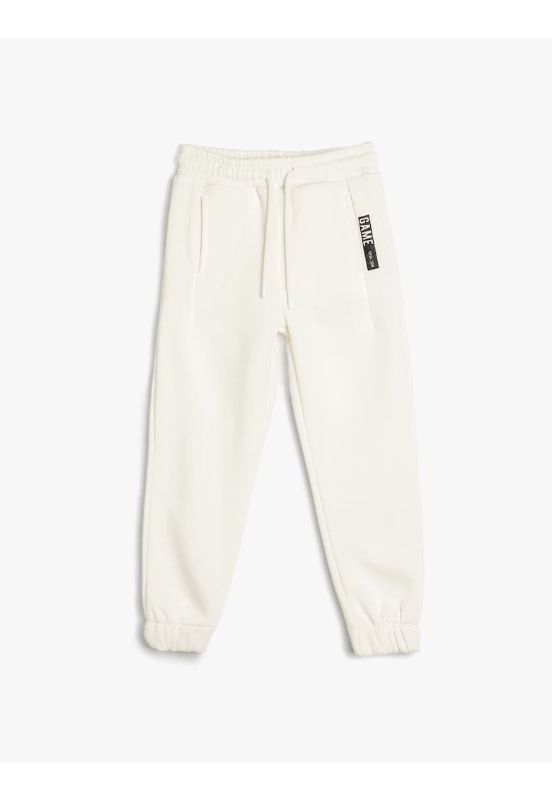 Pantaloni de trening uni cu snur