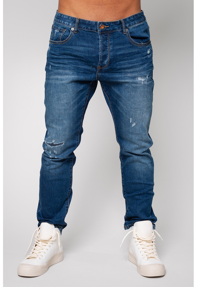 Blugi slim fit cu detalii deteriorate