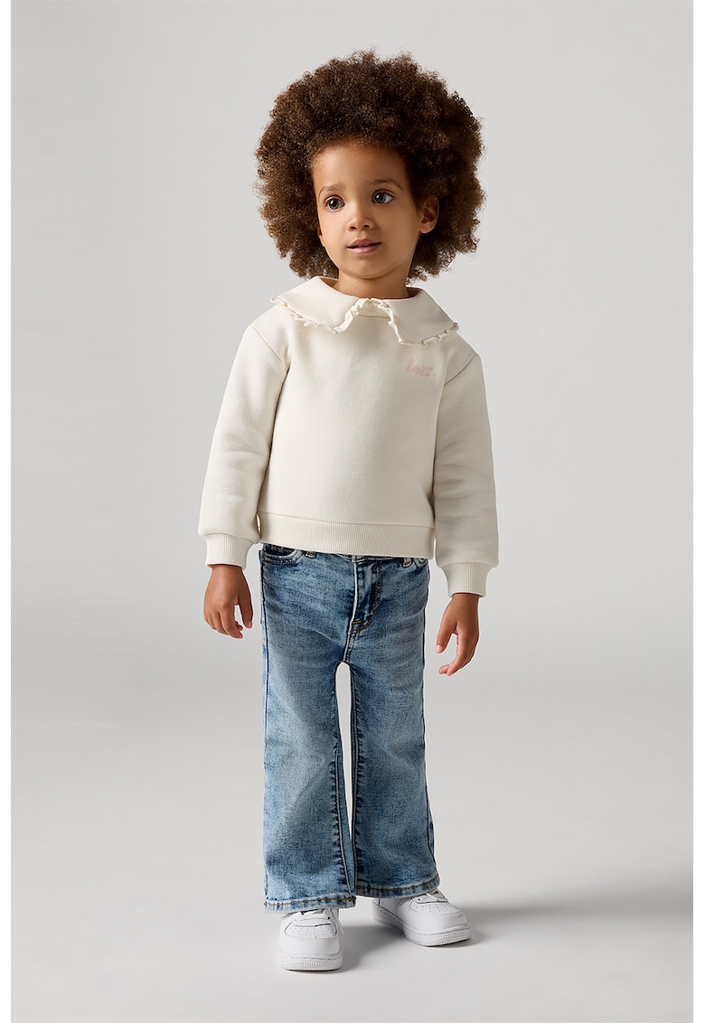 Blugi evazati cu aspect decolorat