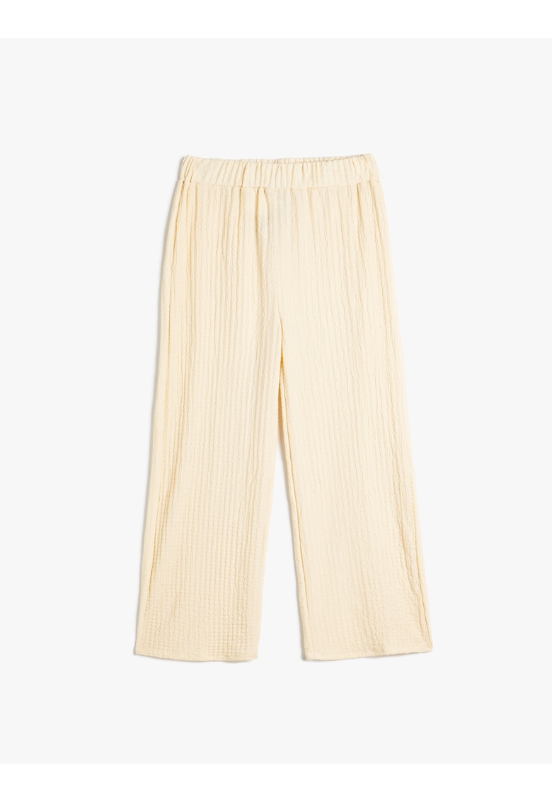 Pantaloni texturati cu croiala ampla