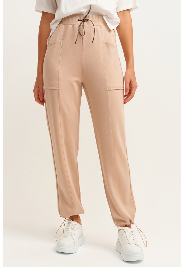 Pantaloni conici cu talie elastica - Crem