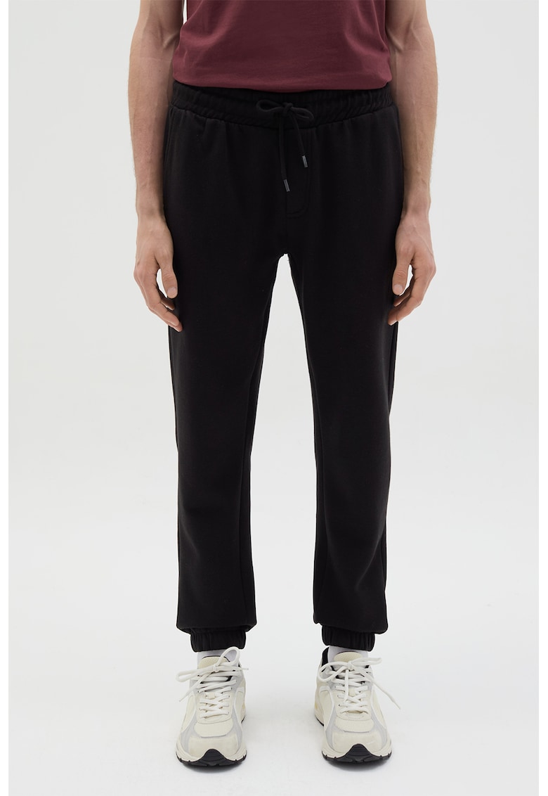 Pantaloni de trening din amestec de bumbac cu buzunare