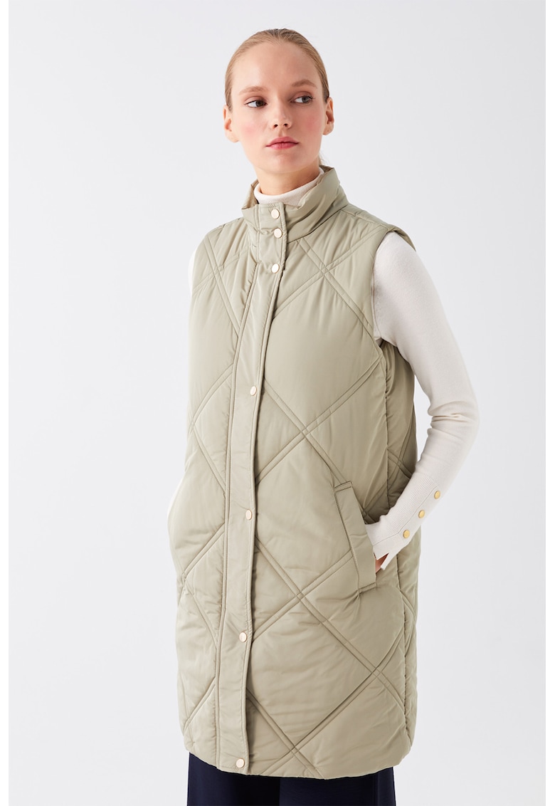 Vesta lunga cu buzunare oblice