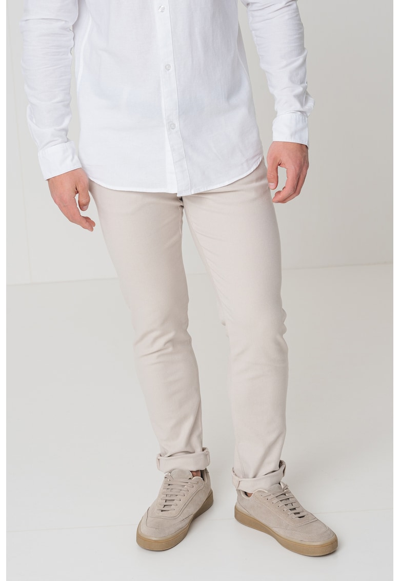 Pantaloni slim fit cu buzunare oblice