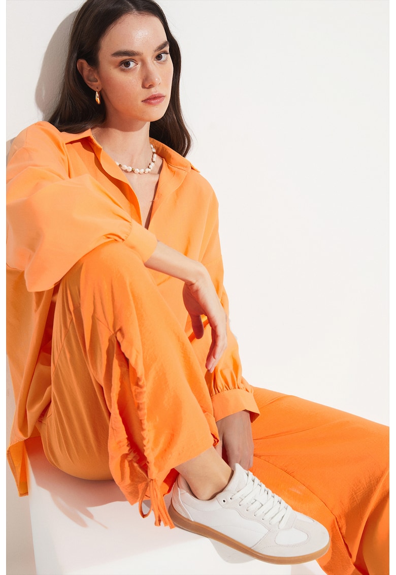 Pantaloni cu croiala ampla cu terminatie ajustabila