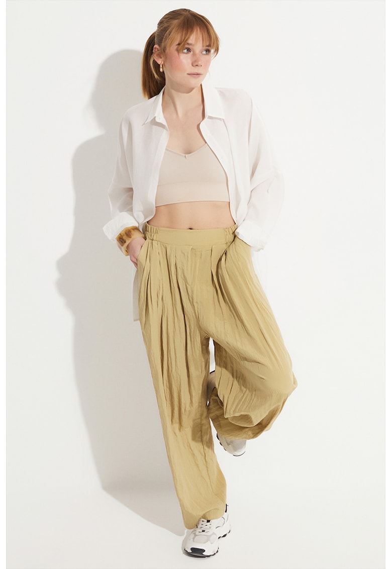 Pantaloni cu talie inalta si buzunare laterale