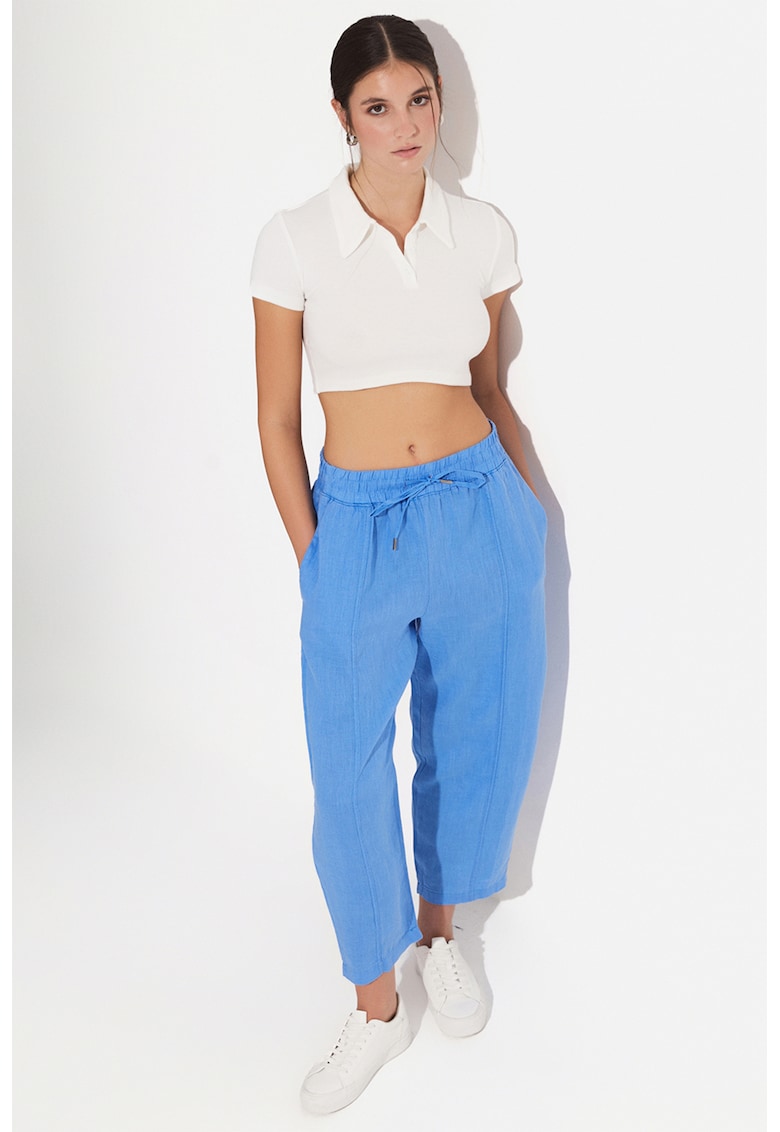 Pantaloni conici cu model uni