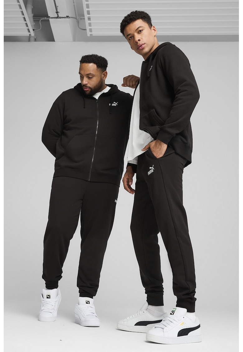 Pantaloni de trening cu croiala conica si buzunare laterale