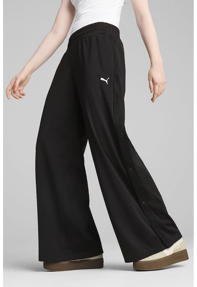 Pantaloni cu croiala ampla si garnituri laterale cu capse ESS