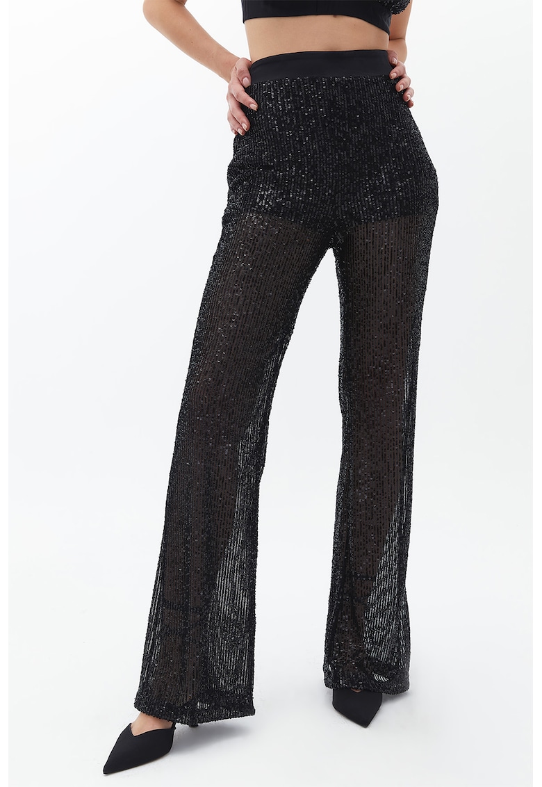 Pantaloni cu croiala ampla si paiete