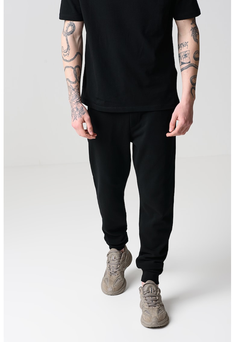 Pantaloni de trening uni cu snur