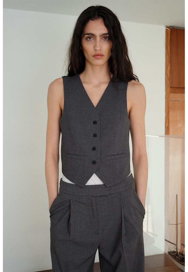 Vesta cu decolteu in V si curea ajustabila