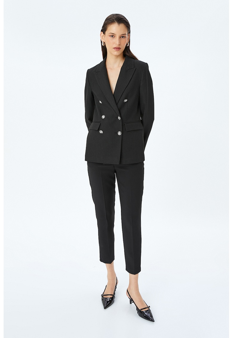 Pantaloni conici capri