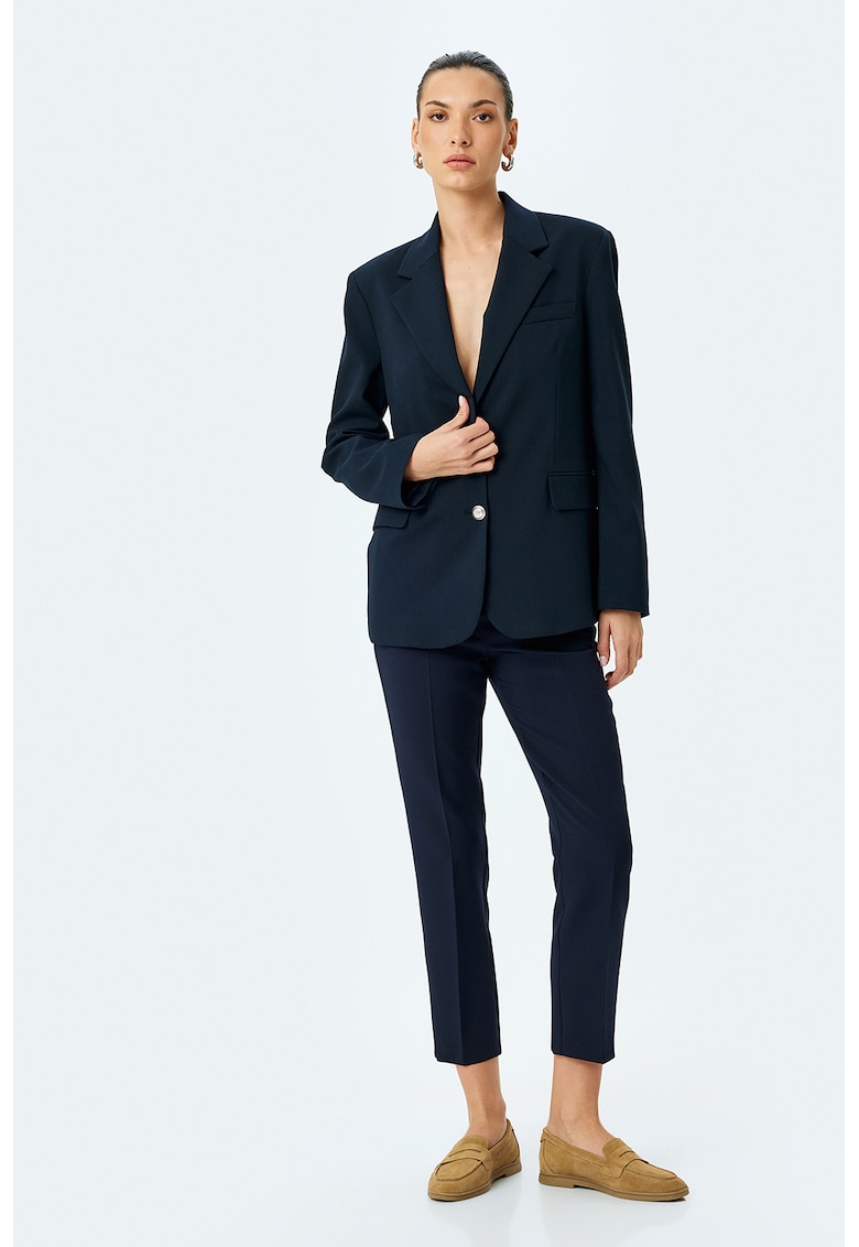 Pantaloni capri conici