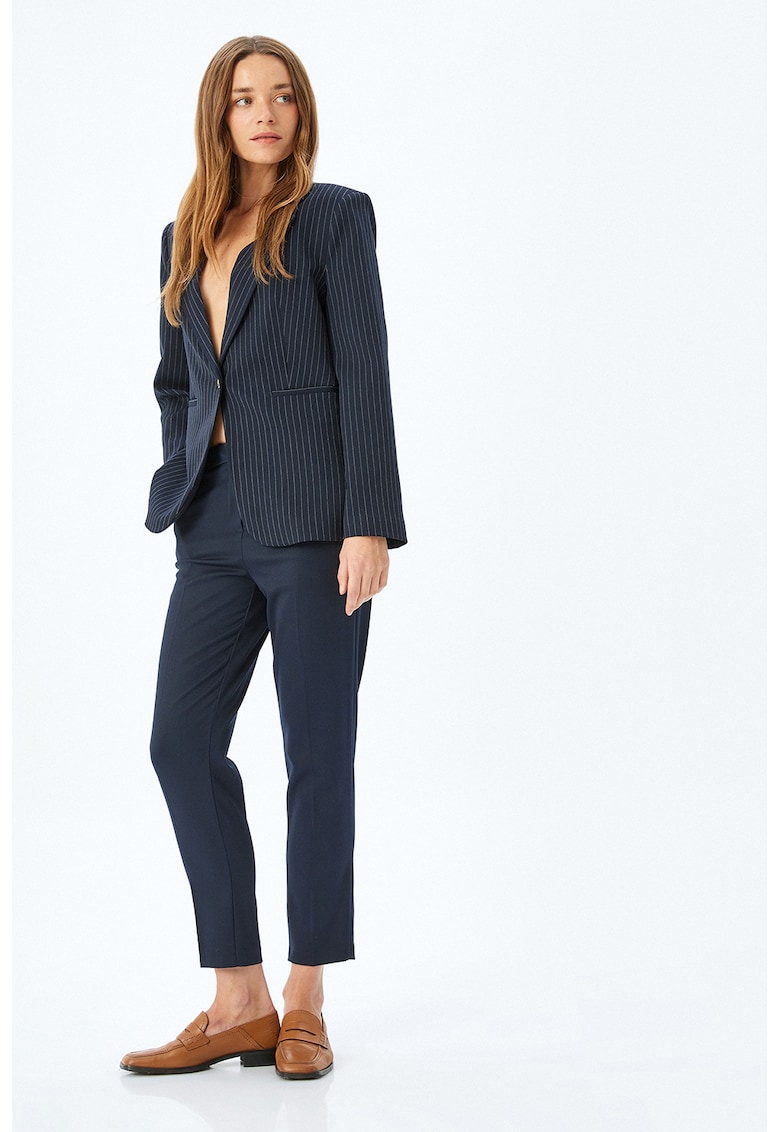 Pantaloni conici capri