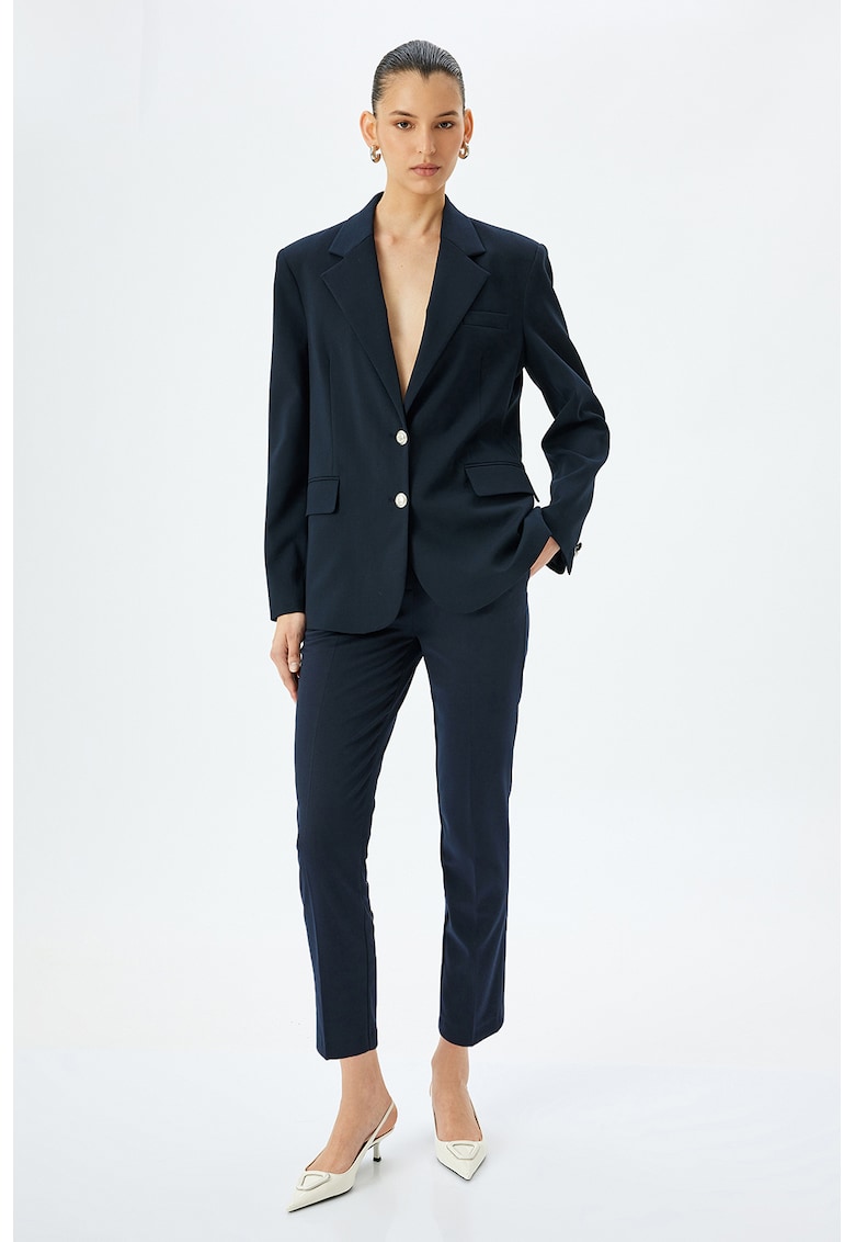 Pantaloni capri conici