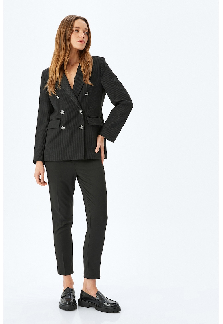 Pantaloni capri conici