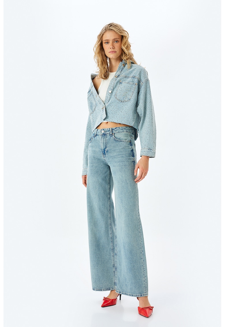Blugi cu croiala ampla si aspect decolorat