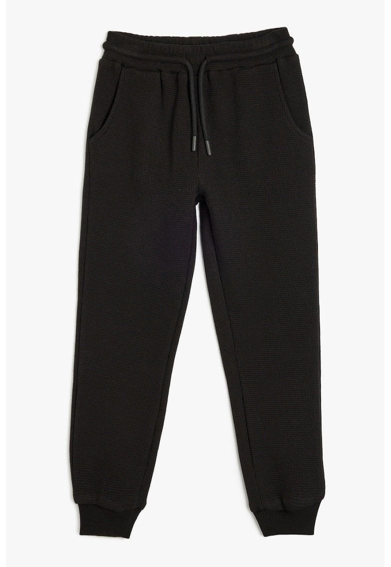 Pantaloni de trening cu model texturat si snur