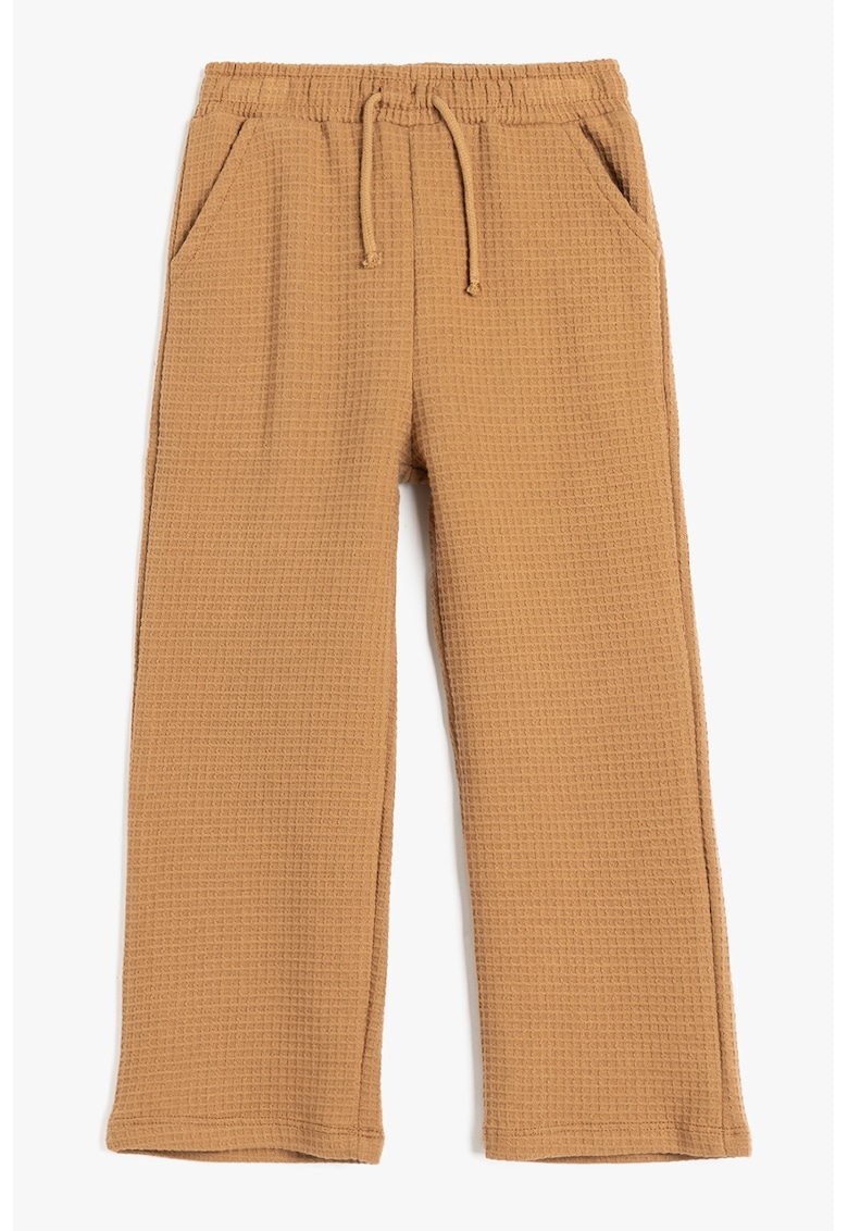 Pantaloni texturati cu buzunare laterale