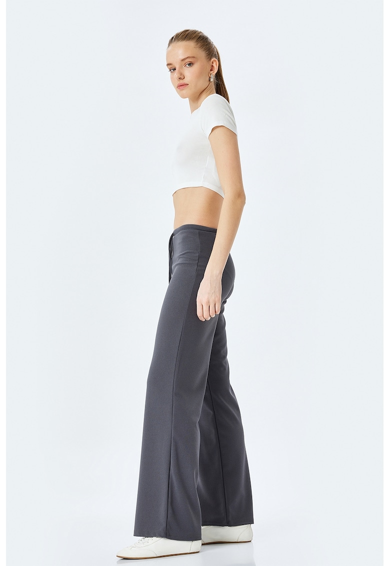 Pantaloni lungi cu model uni si croiala ampla