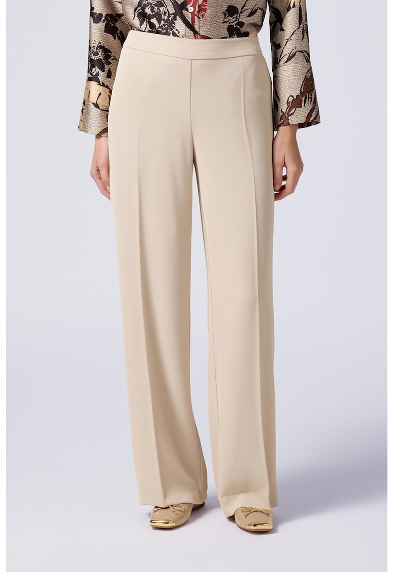 Pantaloni cu croiala ampla si talie elastica