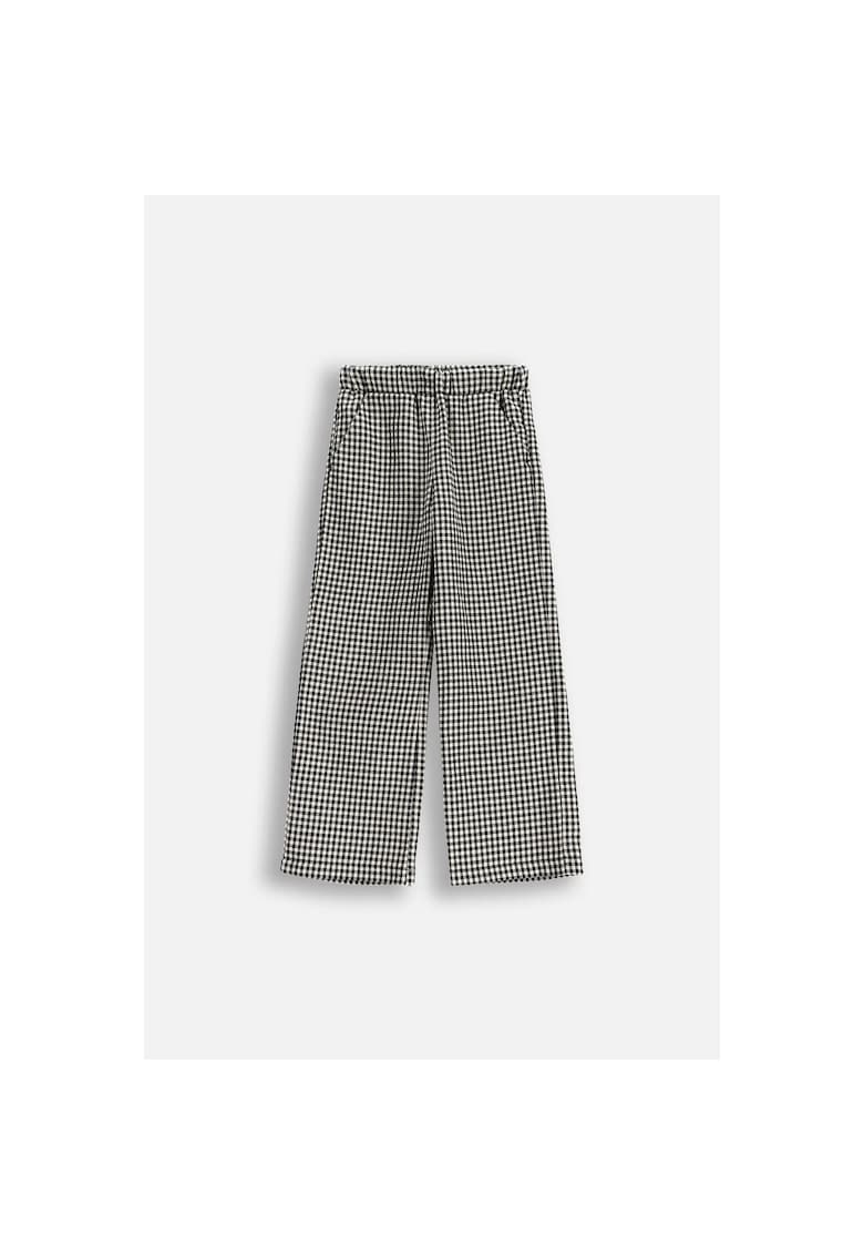 Pantaloni largi cu model in carouri