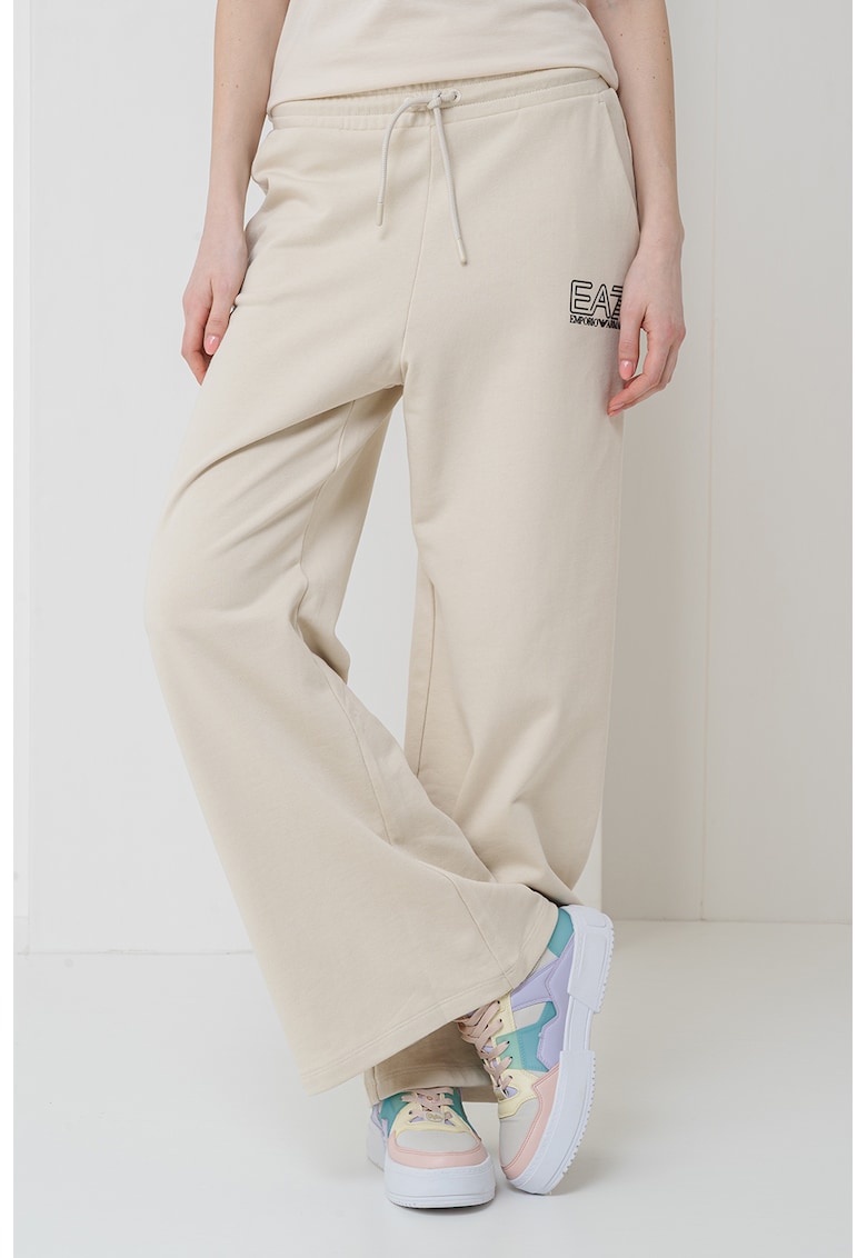 Pantaloni de trening cu croiala ampla si buzunare laterale