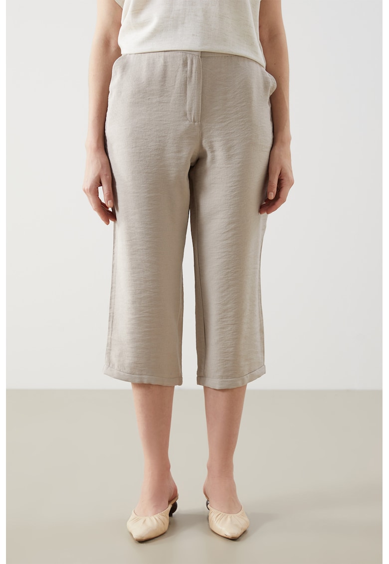 Pantaloni capri cu buzunare laterale