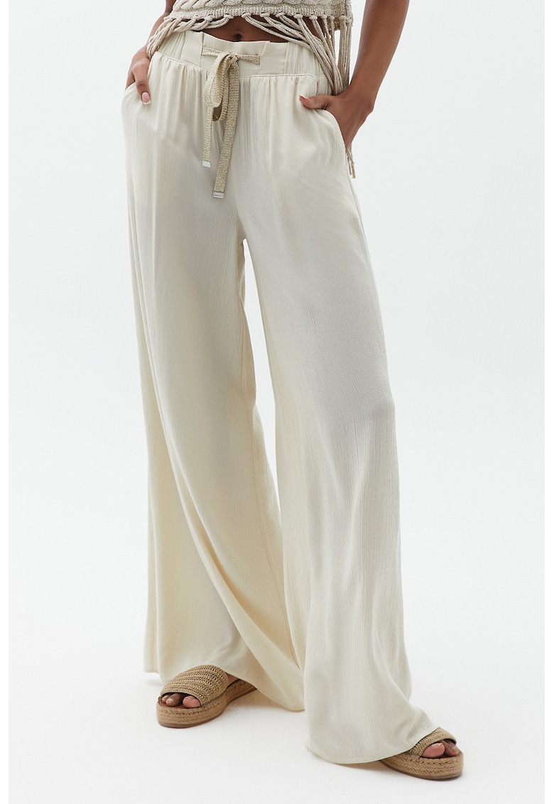 Pantaloni evazati din amestec de lyocell cu buzunare laterale