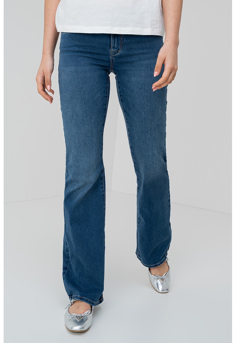 Blugi evazati cu talie joasa