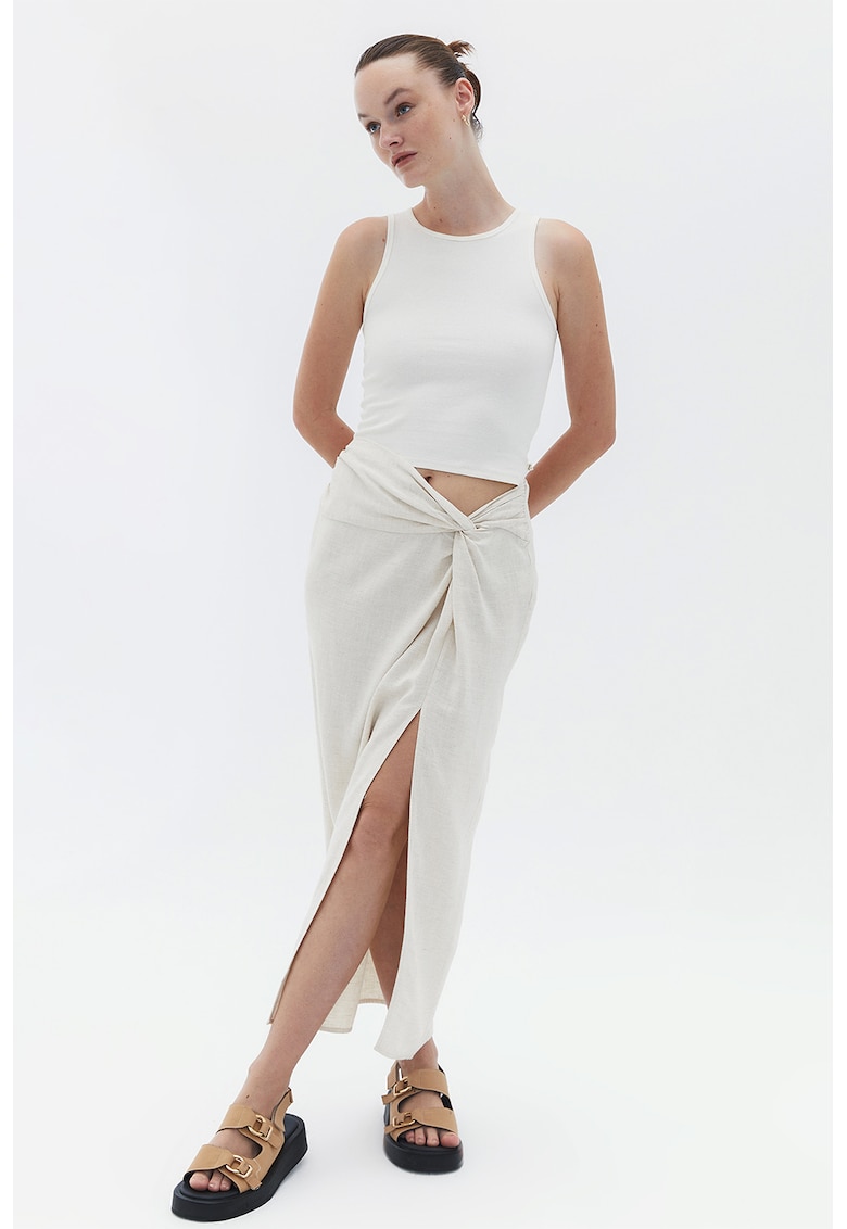 Fusta midi cu buzunare laterale