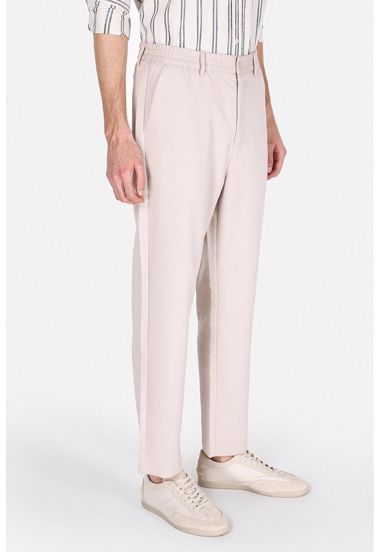 Pantaloni cu buzunare oblice