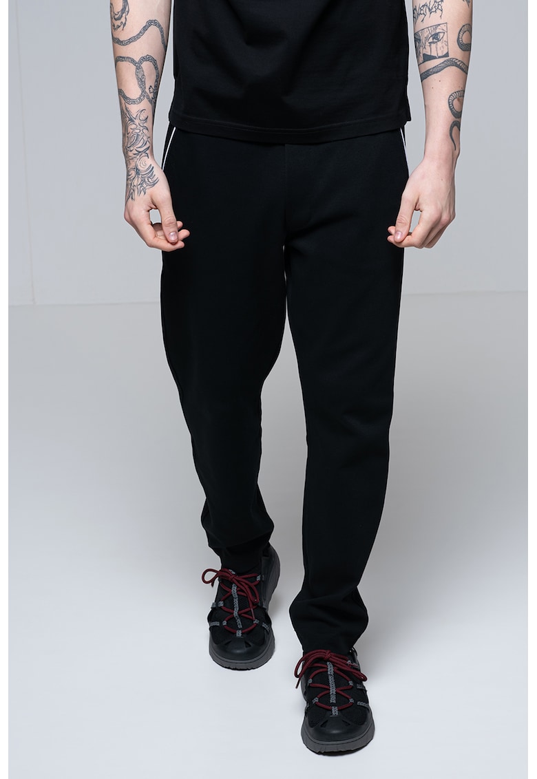 Pantaloni de trening cu croiala conica