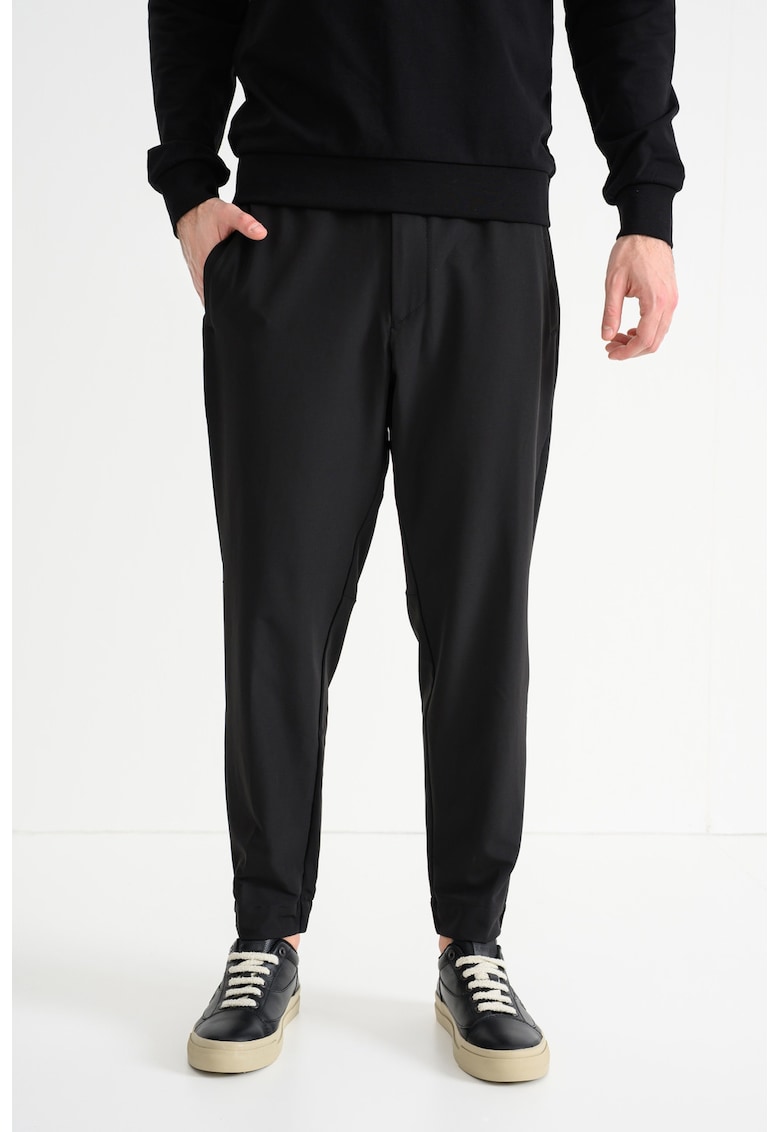 Pantaloni cu croiala conica si snur Flex