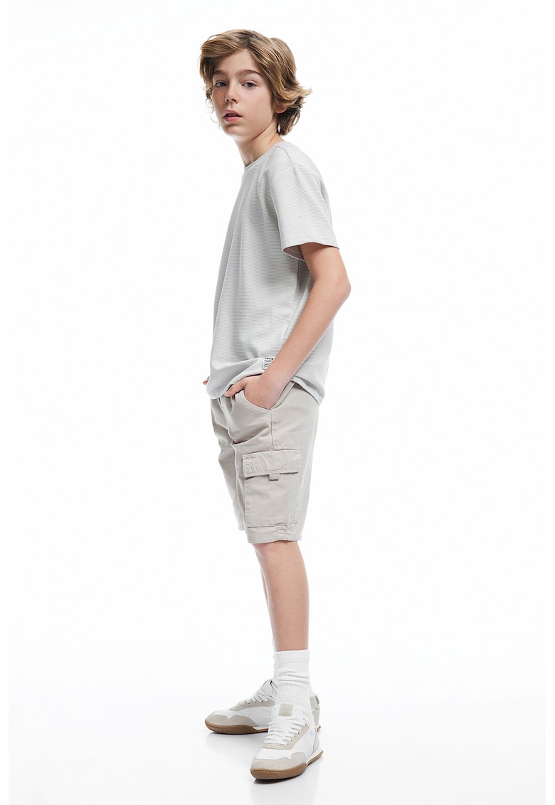 Tricou tricotat fin cu model uni