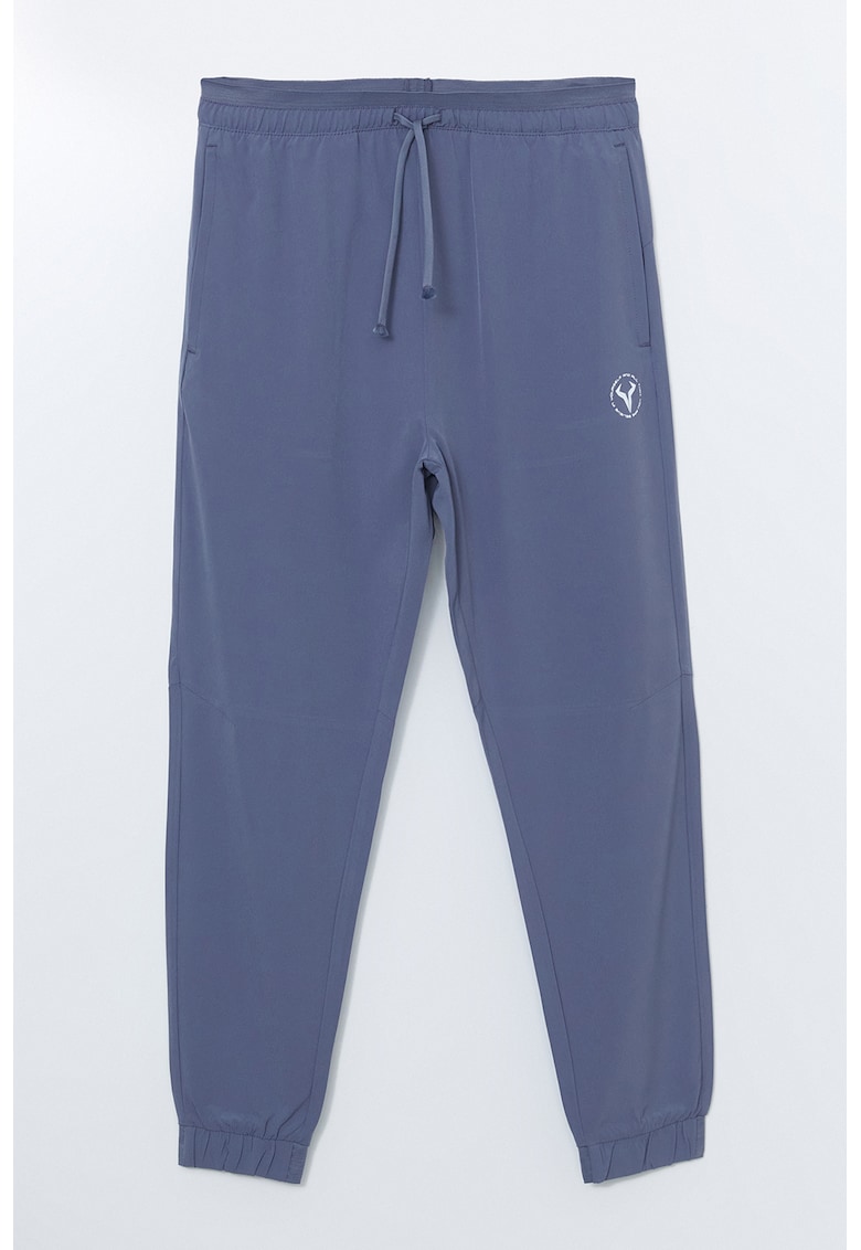 Pantaloni de trening cu model uni si talie elastica