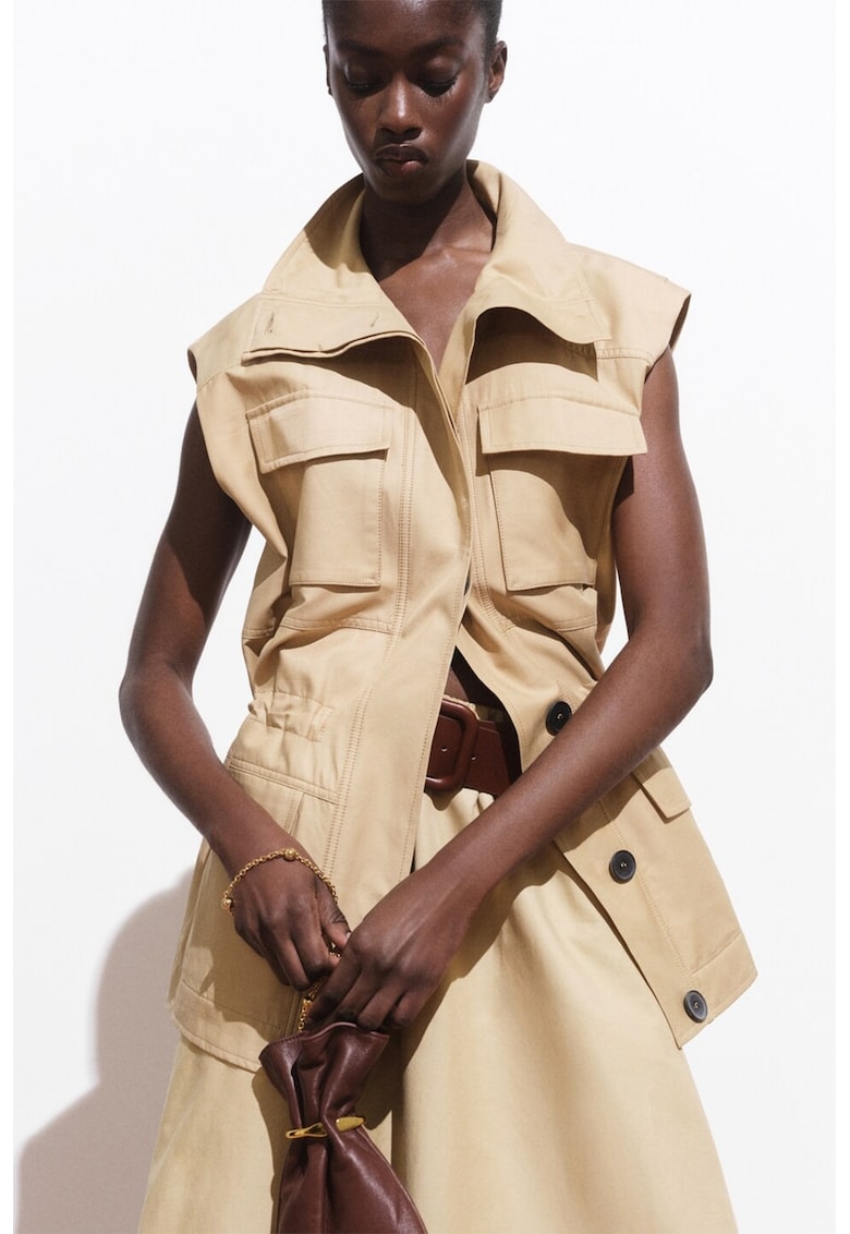 Vesta cu buzunare cu clapa