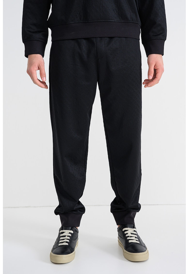 Pantaloni de trening cu snur si buzunare cu fermoar