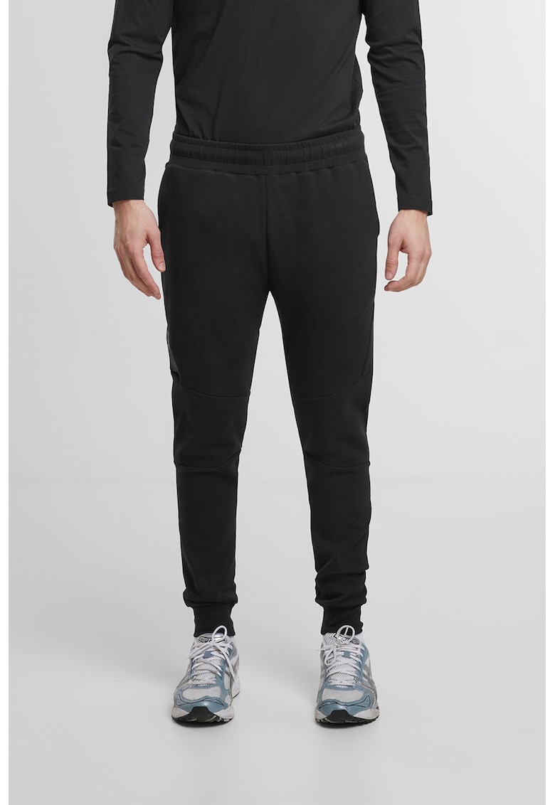 Pantaloni de trening conici