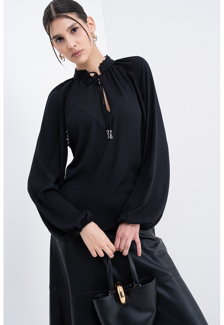 Bluza vaporoasa cu maneci bufante