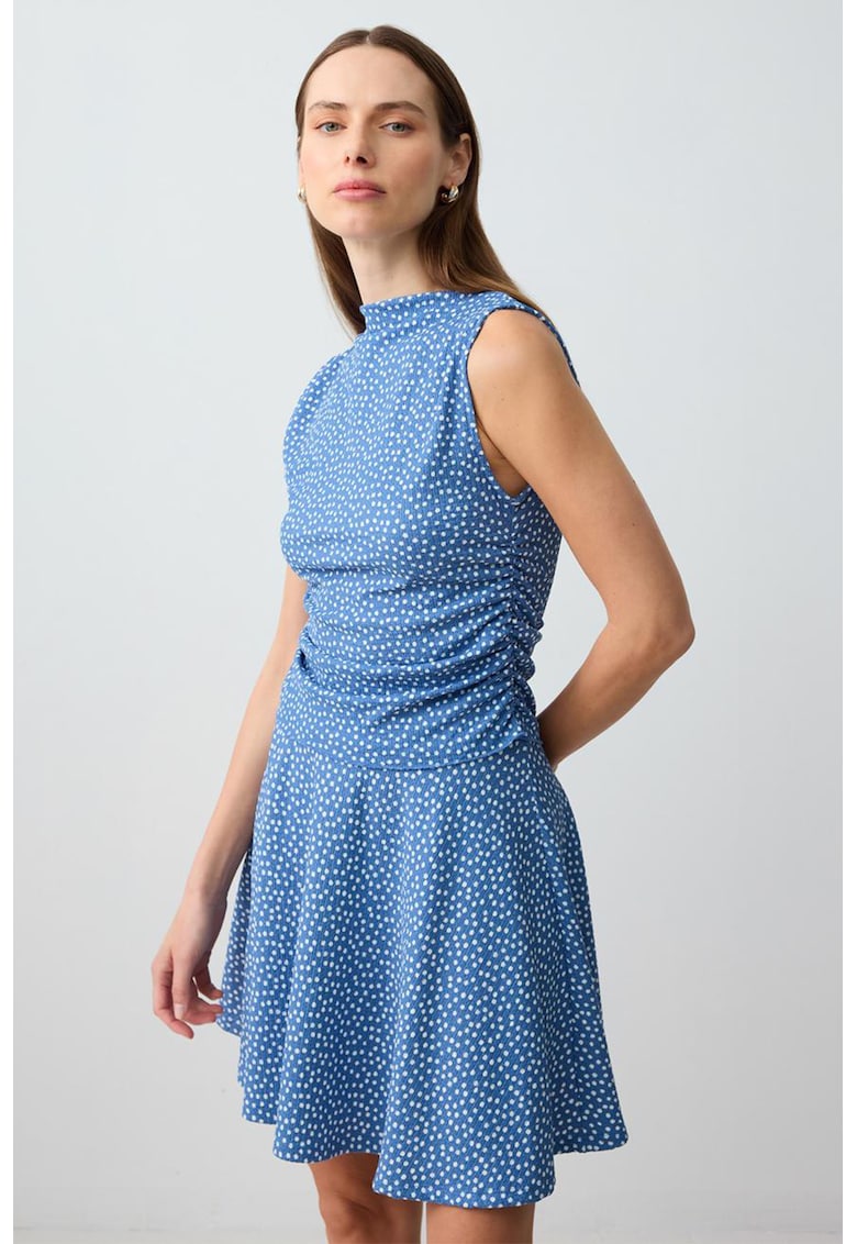 Top drapat cu buline