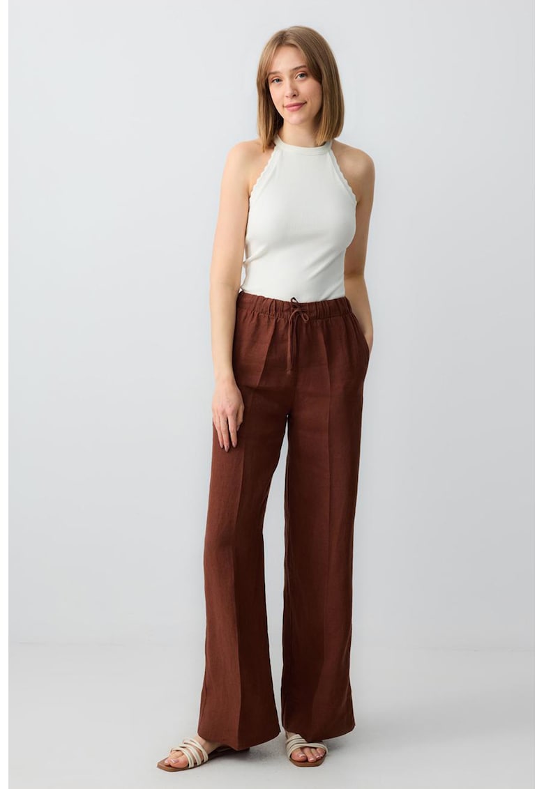 Pantaloni evazati de in cu pensa