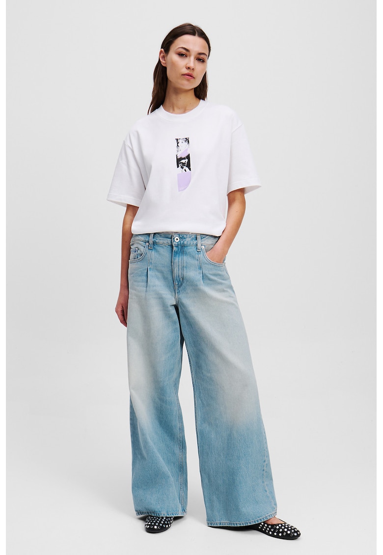 Blugi cu croiala ampla si aspect decolorat Blugi cu croiala ampla si aspect decolorat