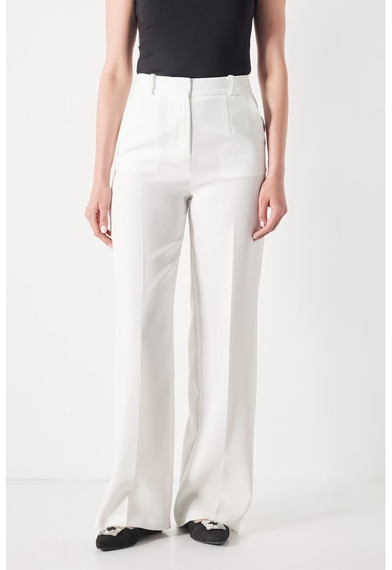 Pantaloni evazati cu buzunare